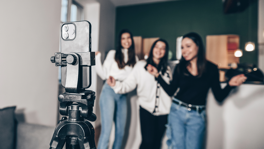 A business owner and her employees try their hand at making a TikTok video as part of a DIY small business content marketing strategy. 