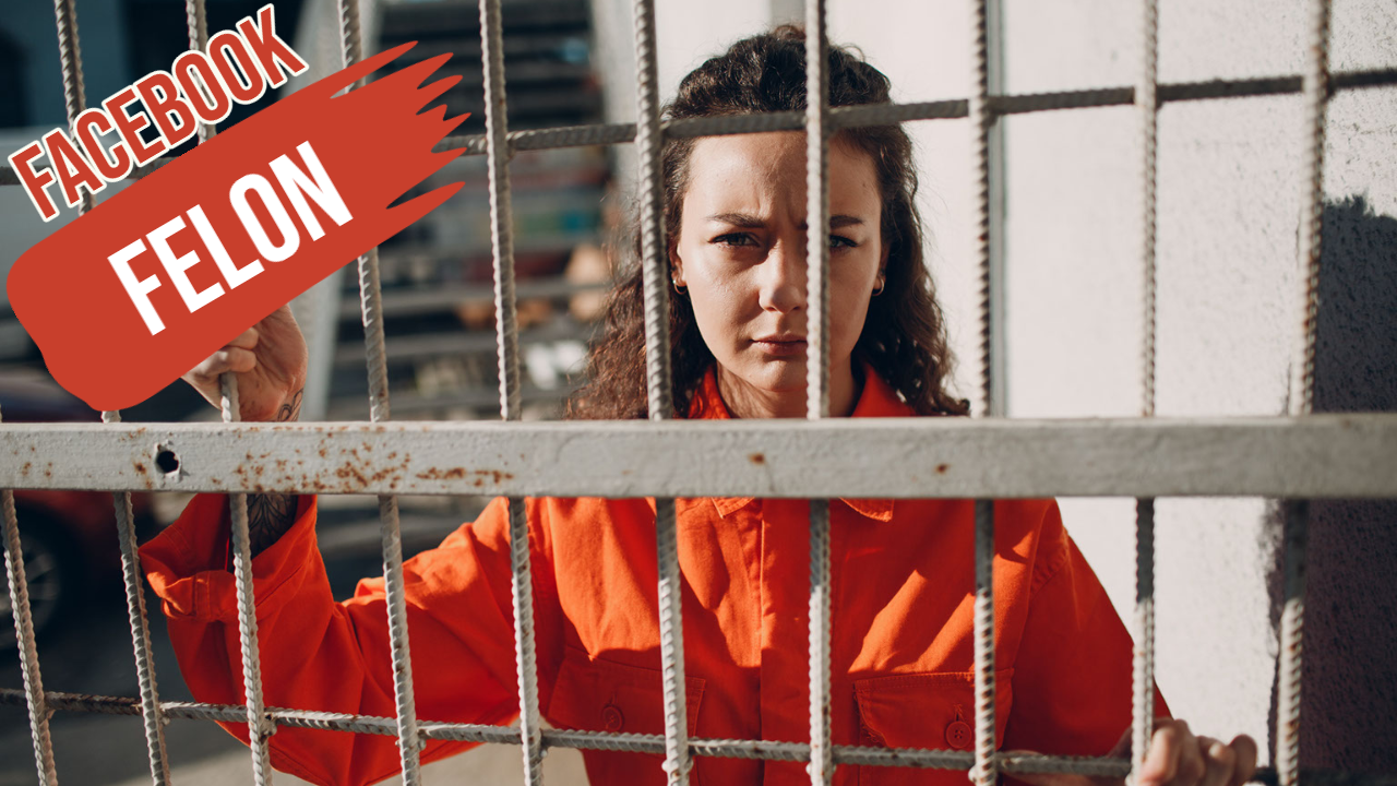 Woman in orange prison garb behind bars. 