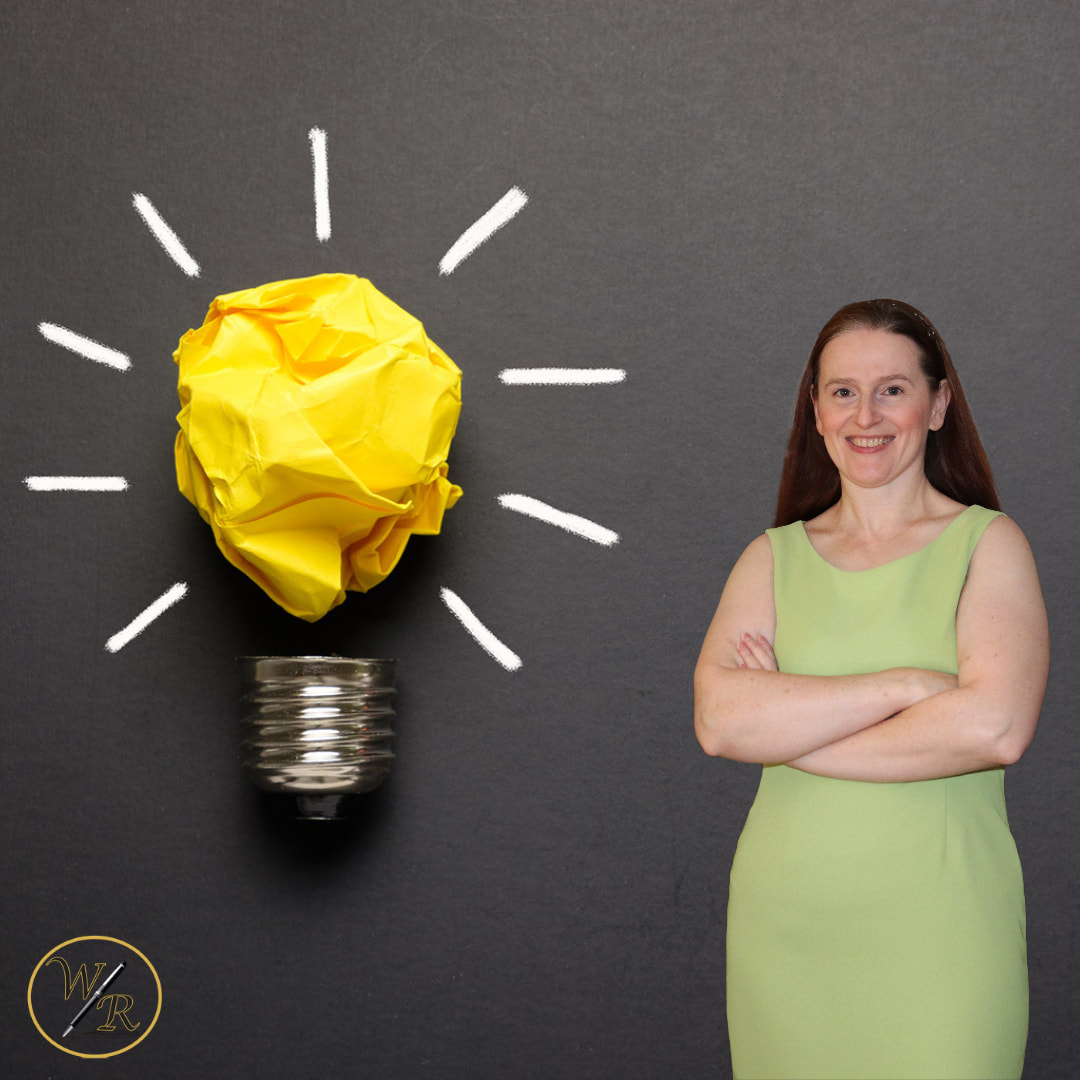 A photo of Shari Berg of The Write Reflection standing next to a light bulb to signify a solution.