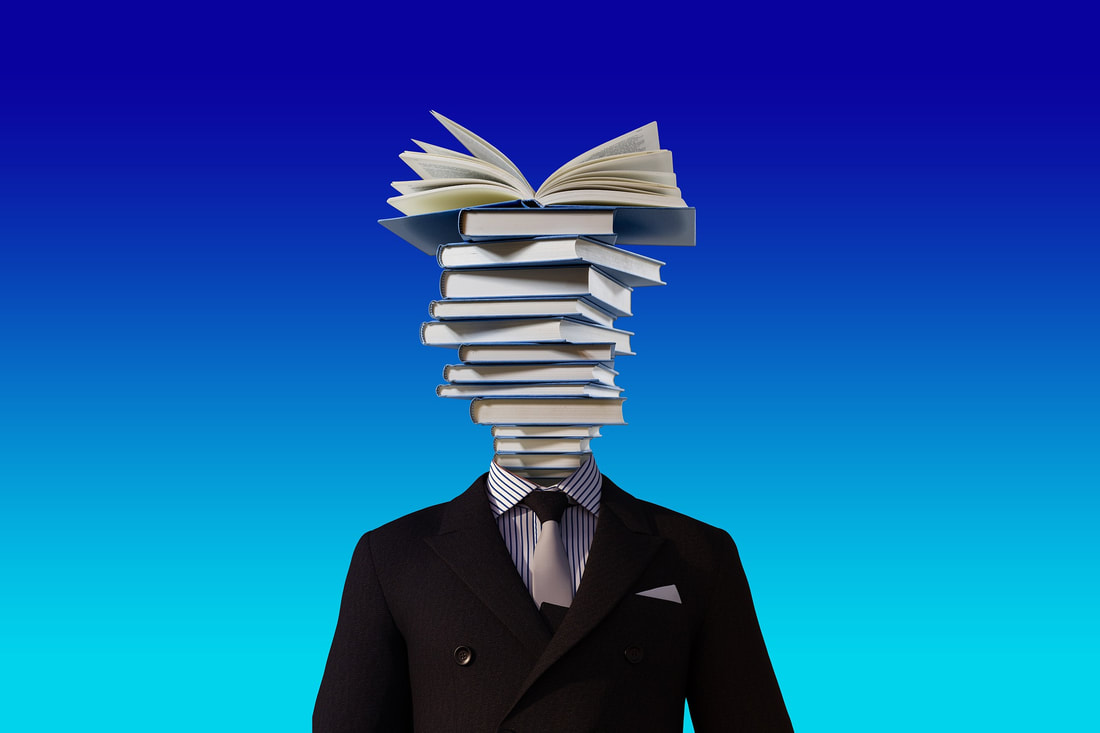 Guy in a business suit with a stack of books in place of his head.